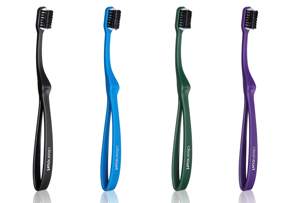 Swiss toothbrush with UltraSoft bristles and multi-coloured handles