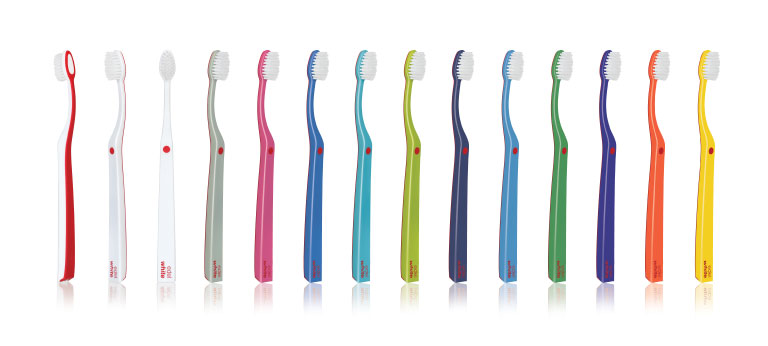 edel white Swiss-made UltraSoft Flosserbrush toothbrush in 12 colours