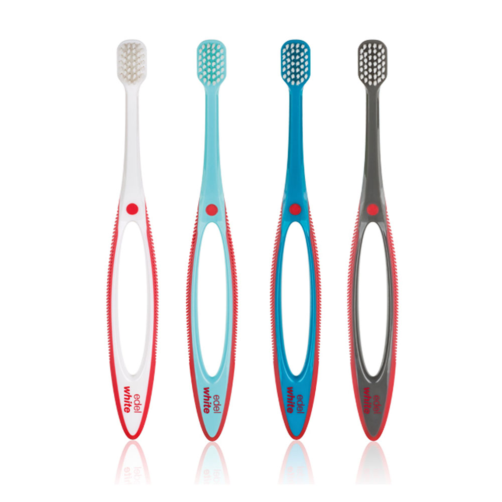 Multicoloured edel white Pro-Gums toothbrush for gum care