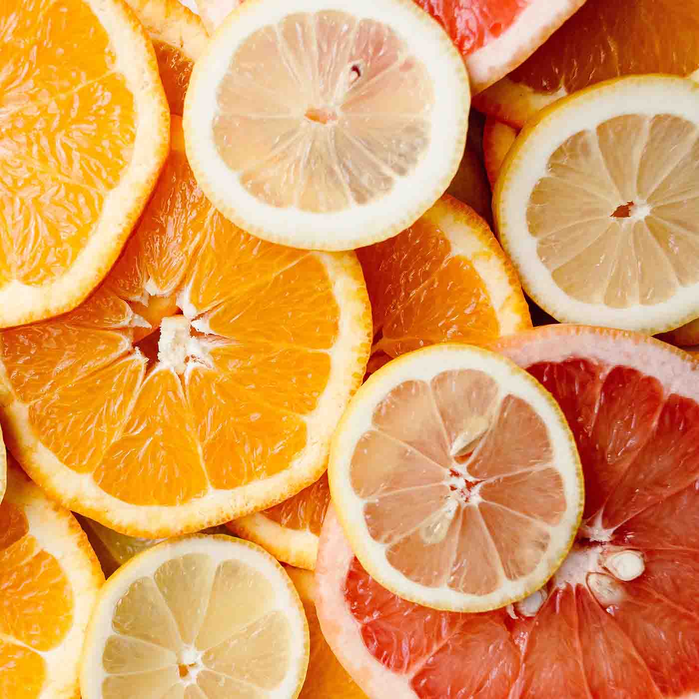 Layered slices of fresh citrus fruits